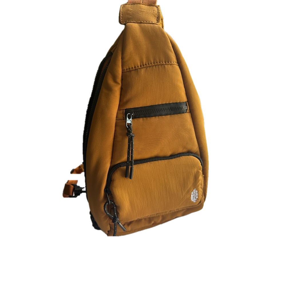 NWOT FREE PEOPLE MOVEMENT CAKEWALK SLING AMBER COPPER BLACK